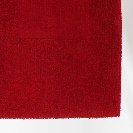 image of Bright red cut out rug