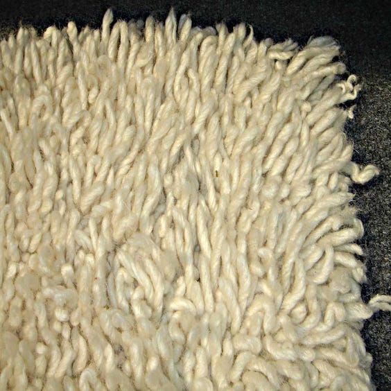 image of Cream wooly shag pile rug