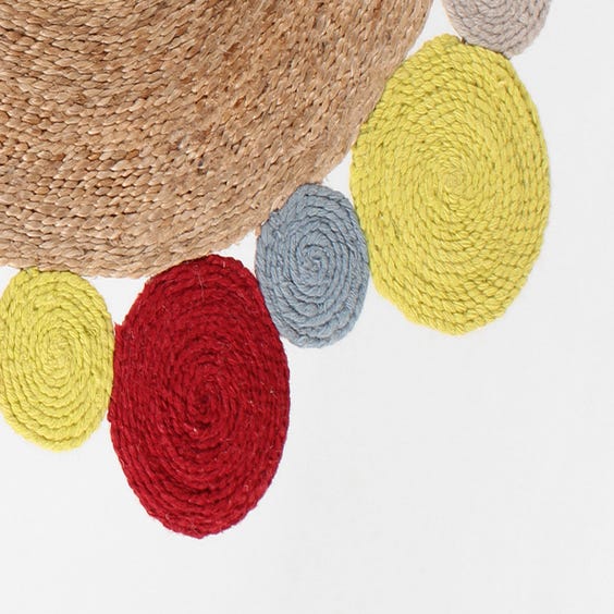image of Small multi coloured straw circular rug