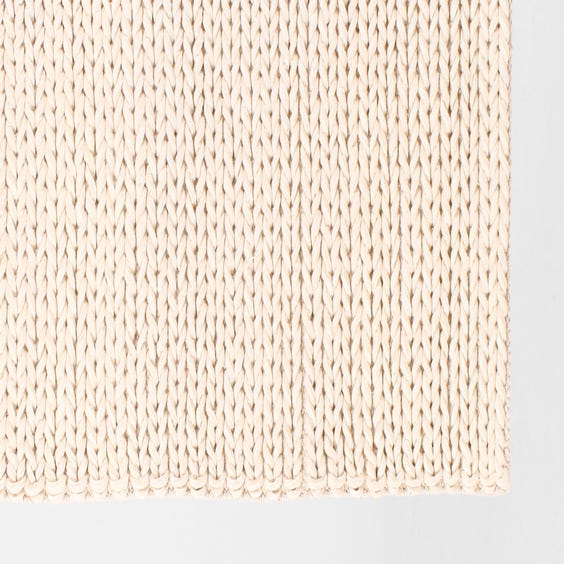 image of Cream chunky plaited wool rug