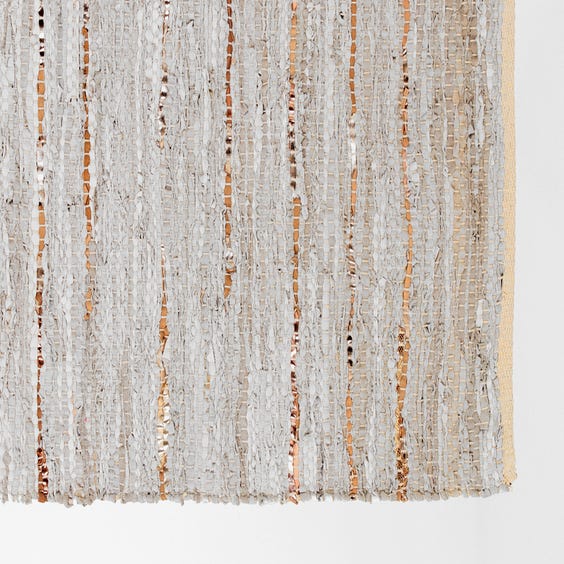 image of Grey leather and rose gold rug