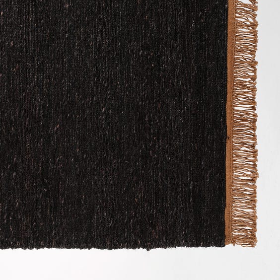 image of Woven black fleck rectangular rug