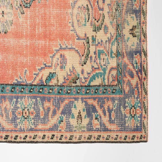 image of Faded pink Turkish floral rug