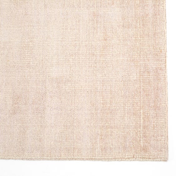 image of Dirty pink sheen knotted rug 