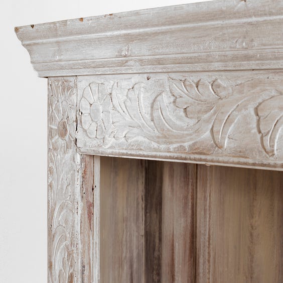 image of White washed carved bookcase