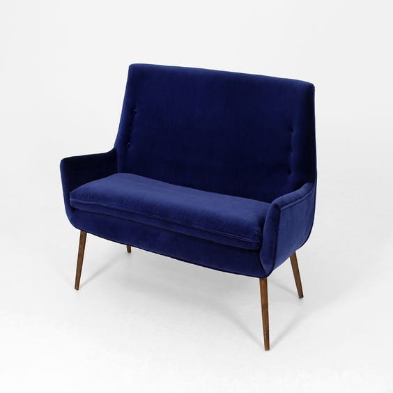 image of Midnight blue velvet two-seater sofa