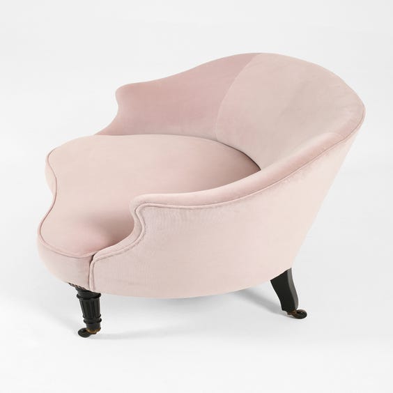 image of Small pink velvet sofa