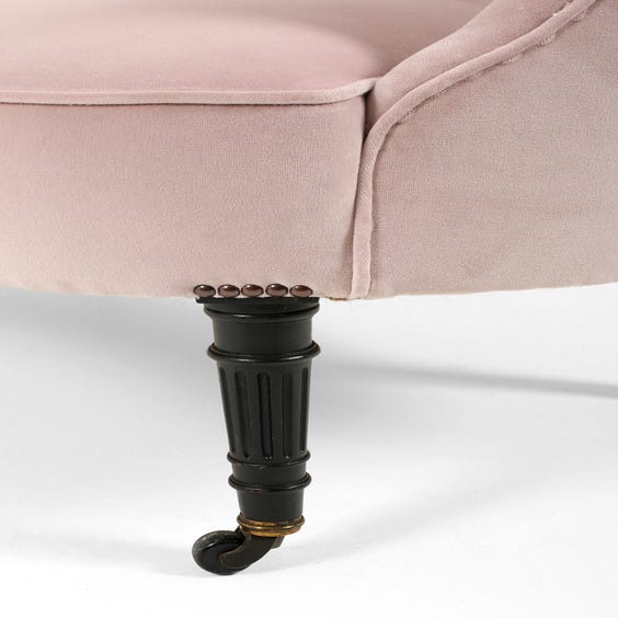 image of Small pink velvet sofa