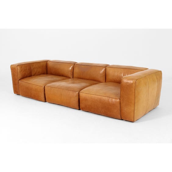image of Vintage tan leather sofa