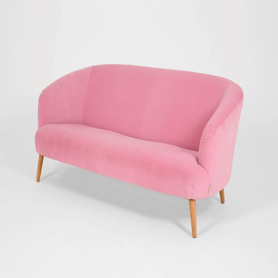 image of Pastel pink velvet sofa