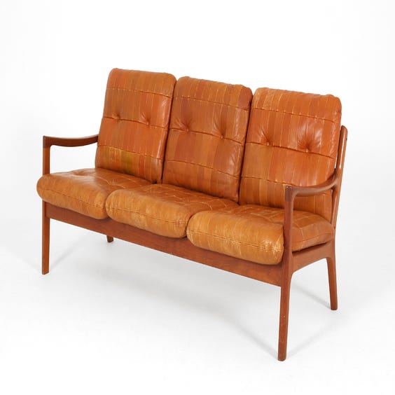 image of Midcentury Danish tan leather sofa