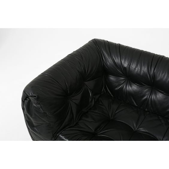 image of 1980's black leather lounge sofa