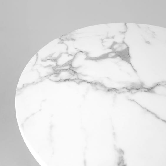 image of Veined faux marble circular table