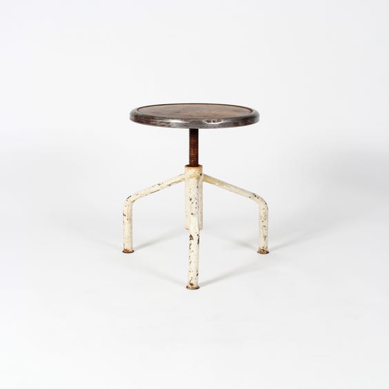 image of 1950s industrial cream tripod stool