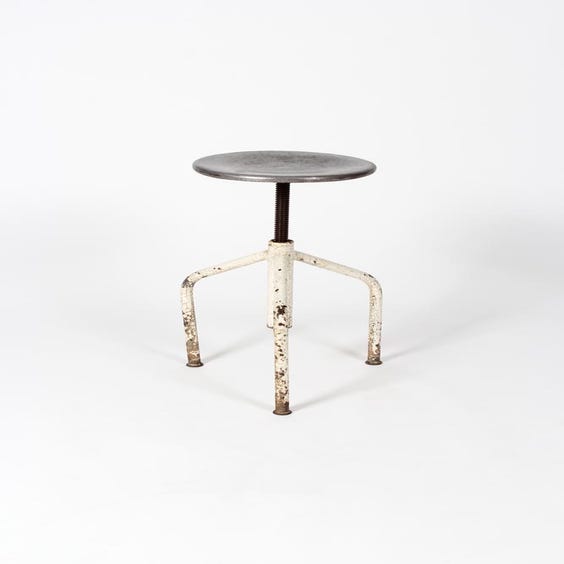 image of 1950s industrial rusted cream stool
