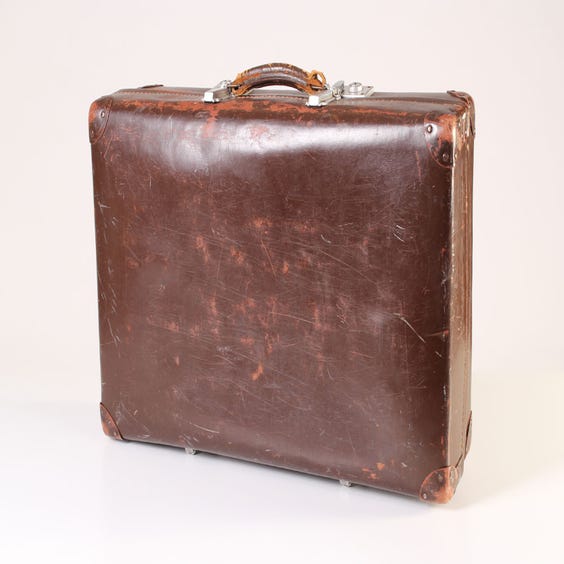image of Brown leather vintage suitcase