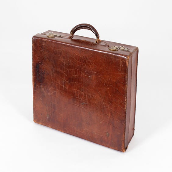 image of Period distressed crocodile effect suitcase