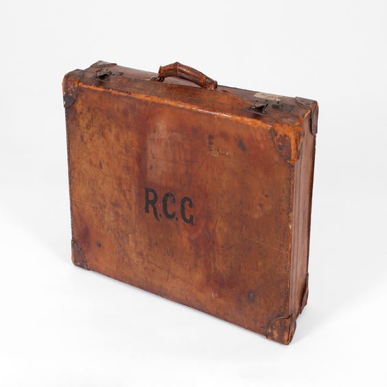 image of Period distressed brown leather suitcase