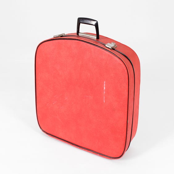 image of Small red vinyl suitcase