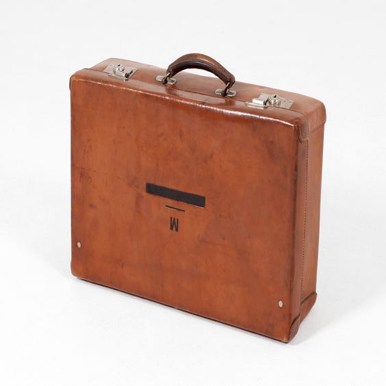 image of Vintage tan leather suitcase