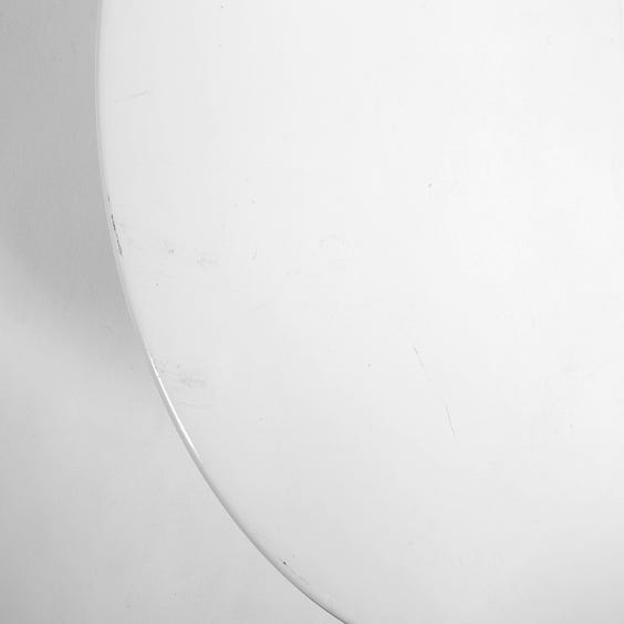 image of White metal circular surface