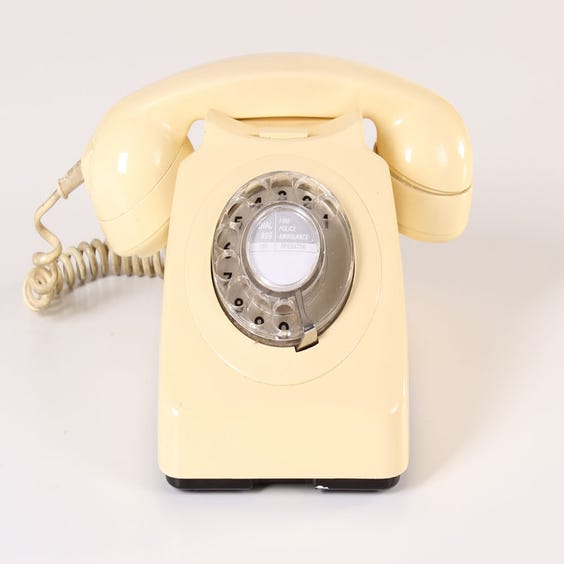 image of Cream period distressed telephone