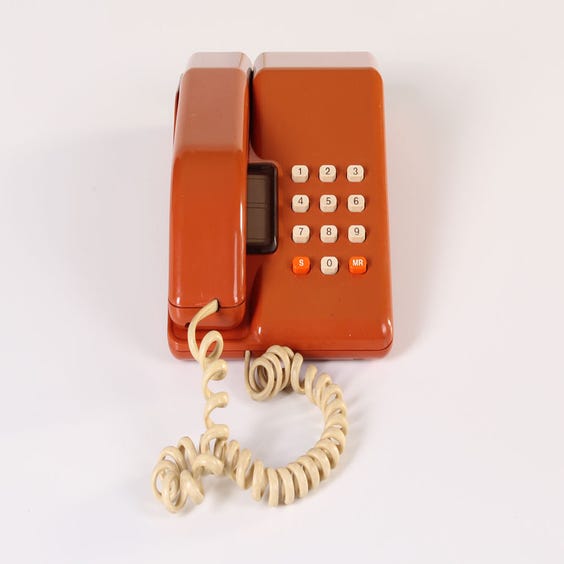 image of 1980s orange telephone