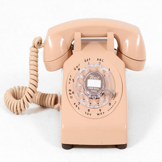image of Flesh coloured vintage telephone