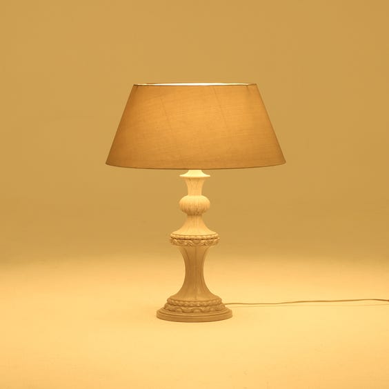 image of Beige distressed carved wood lamp