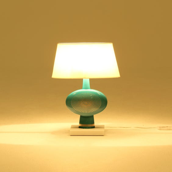 image of Teal ceramic disc shaped table lamp