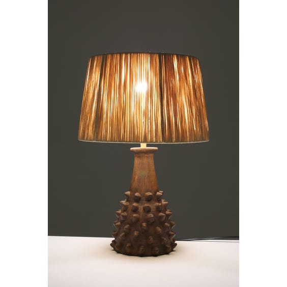 image of Primitive studded table lamp