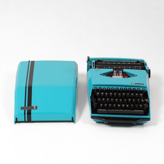 image of Vintage turquoise Corona typewriter