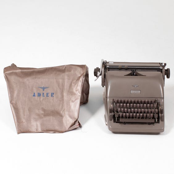 image of Vintage Adler metallic grey typewriter