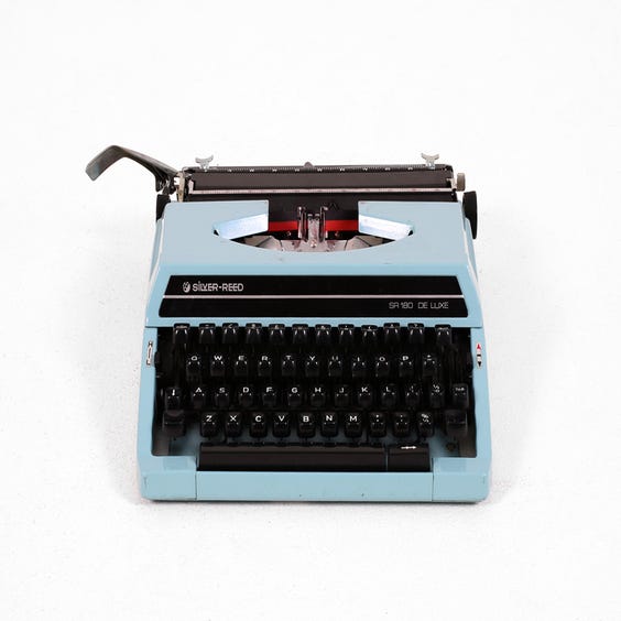 image of Vintage pale blue typewriter